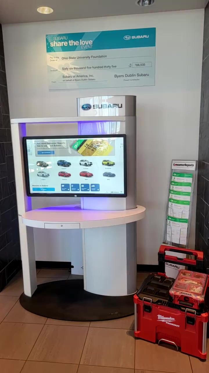 Commercial screen mounted at a customer information kiosk